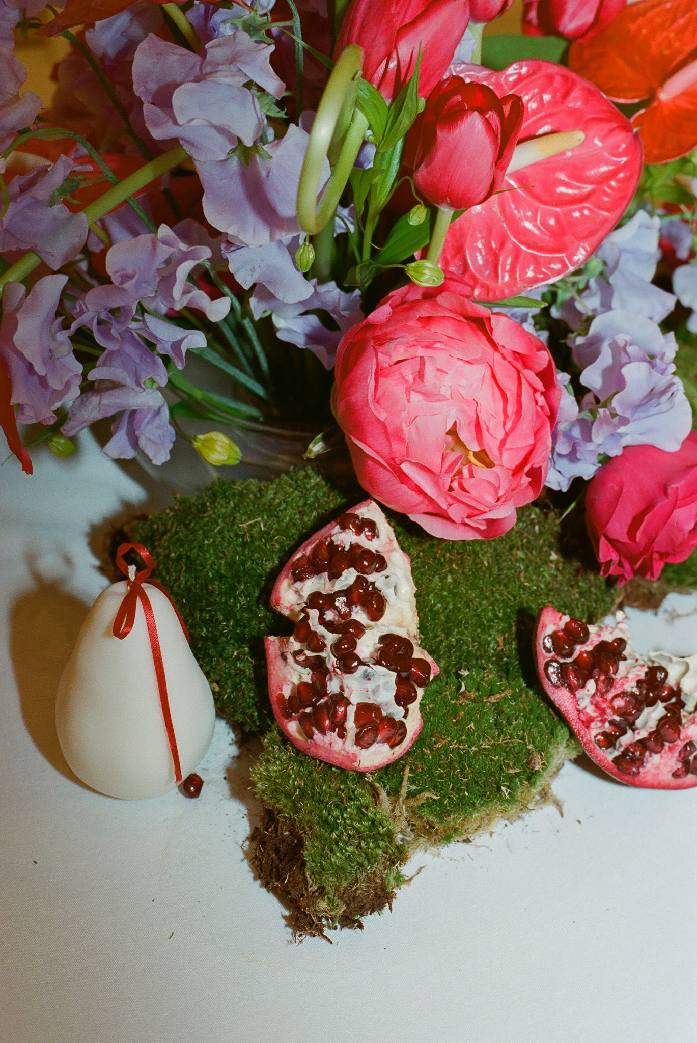 pomegranate floral arrangement pink and purple flowers shot on film by parkers pictures
